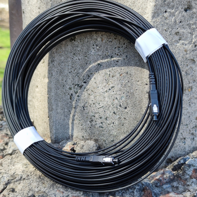 Патч-корд CMS SC/UPC-SC/UPC SM, FTTH плоский, зовнішнього виконання 50 м, Simplex (UPC-50SCSC(SM)S(ON)FTTH-OD)